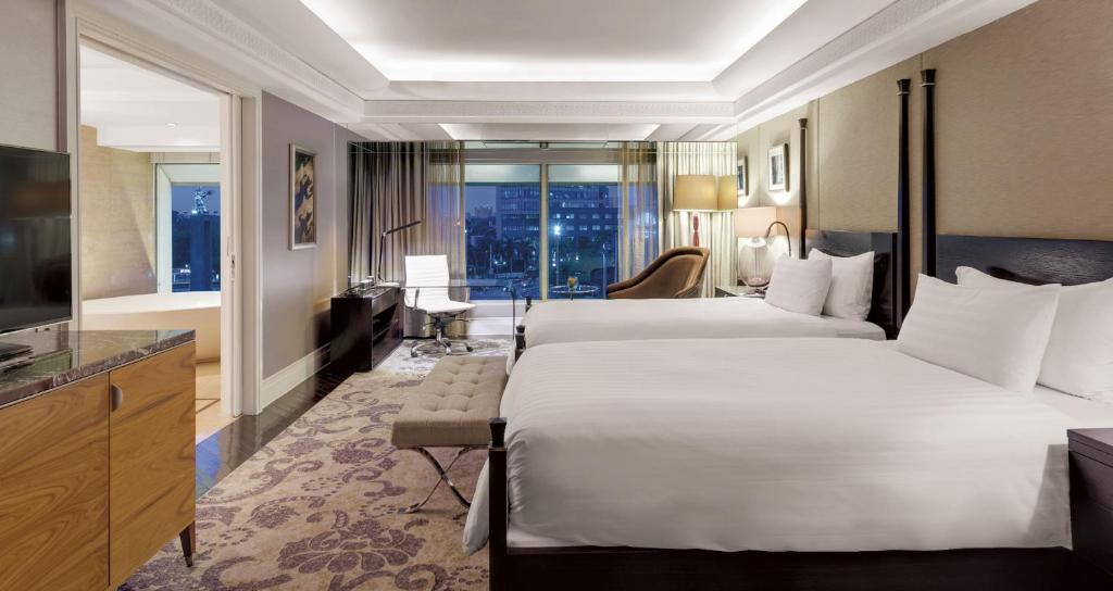 Kamar Twin Bed Executive Grand Deluxe - Panduan Lengkap Fasilitas dan Layanan di Hotel Indonesia Kempinski Jakarta - jakartatraveller.com