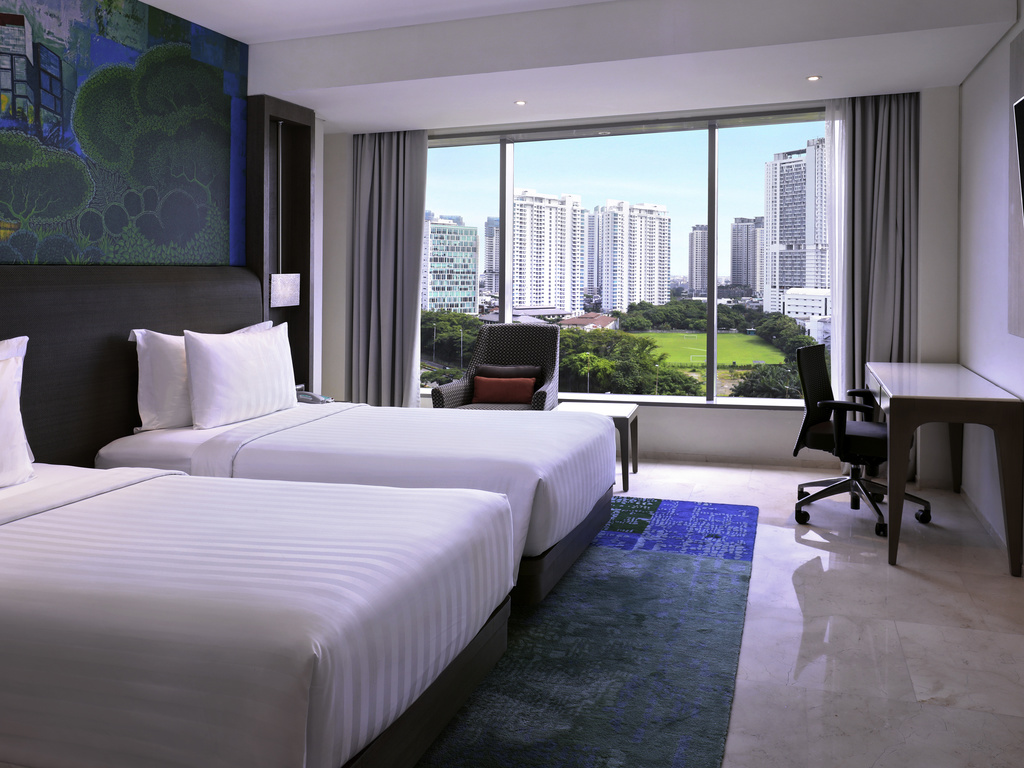 Kamar Deluxe Room Twin Bed - Panduan Lengkap Menginap di Hotel Grand Mercure Jakarta Kemayoran: Fasilitas, Layanan, dan Tips Eksklusif - jakartatraveller.com