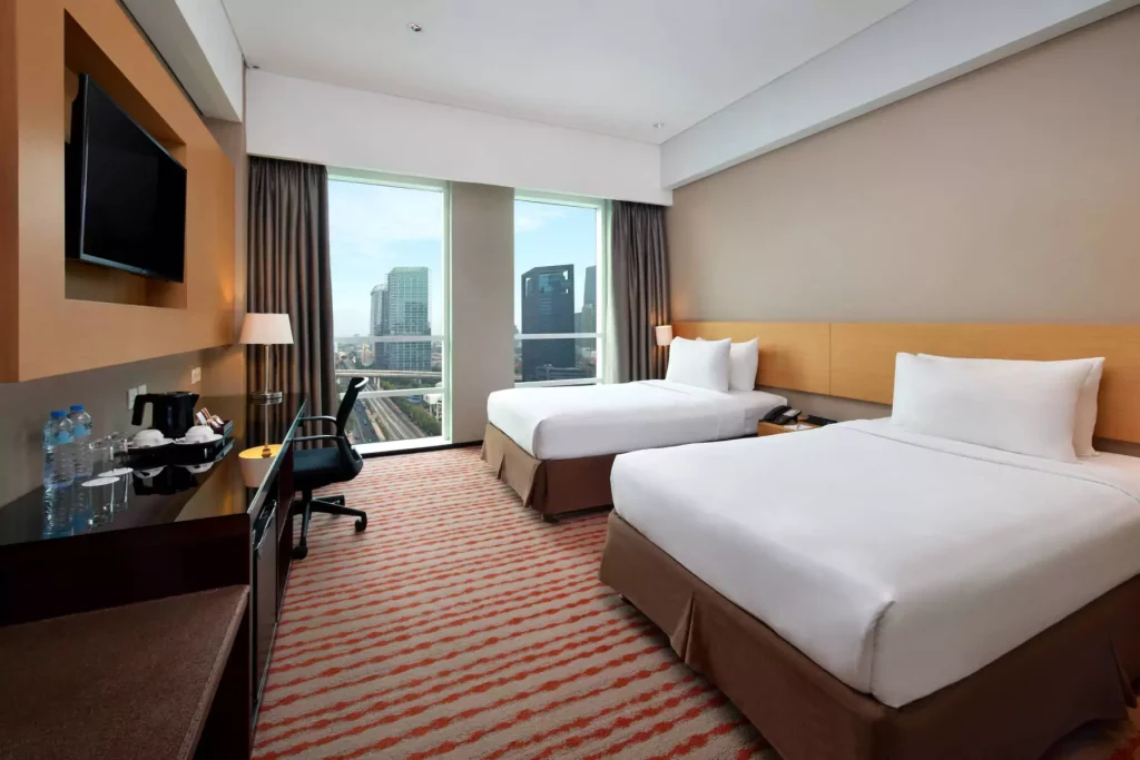 Kamar Deluxe Room - Menginap Mewah Tanpa Merogoh Kocek Dalam di Hotel JS Luwansa: Panduan Lengkap untuk Wisatawan - jakartatraveller.com